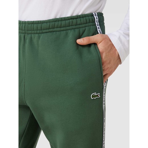 Spodnie dresowe z paskami z logo model ‘TAPE’ Lacoste L okazja Peek&Cloppenburg 