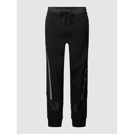 Spodnie dresowe z wpuszczanymi kieszeniami model ‘Hadikon’ ze sklepu Peek&Cloppenburg  w kategorii Spodnie męskie - zdjęcie 168307795
