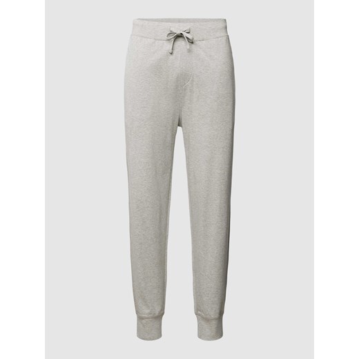 Spodnie dresowe z elastycznym ściągaczem ze sklepu Peek&Cloppenburg  w kategorii Spodnie męskie - zdjęcie 168324296