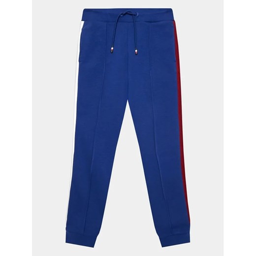 Tommy Hilfiger Spodnie dresowe Globral Stripes KB0KB08404 D Niebieski Regular Fit ze sklepu MODIVO w kategorii Spodnie chłopięce - zdjęcie 168379967