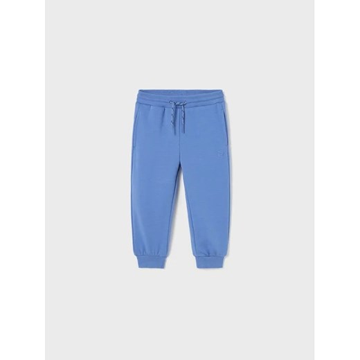 Mayoral Spodnie dresowe 711 Niebieski Regular Fit ze sklepu MODIVO w kategorii Spodnie i półśpiochy - zdjęcie 168403597