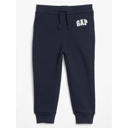 Gap Spodnie dresowe 633913-00 Granatowy Regular Fit ze sklepu MODIVO w kategorii Spodnie chłopięce - zdjęcie 168415645