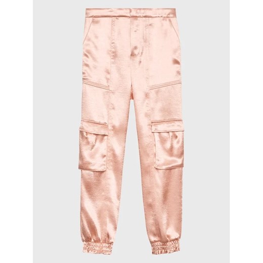 Guess Spodnie dresowe J3GB08 WECV2 Różowy Relaxed Fit ze sklepu MODIVO w kategorii Spodnie dziewczęce - zdjęcie 168416289