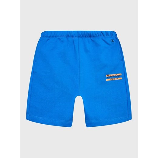 Calvin Klein Jeans Szorty sportowe Mini Block Logo IB0IB01614 Niebieski Regular Fit ze sklepu MODIVO w kategorii Spodenki chłopięce - zdjęcie 168425657