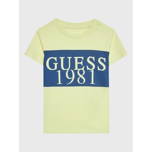Guess T-Shirt N3GI02 K8HM0 Żółty Regular Fit ze sklepu MODIVO w kategorii T-shirty chłopięce - zdjęcie 168446776