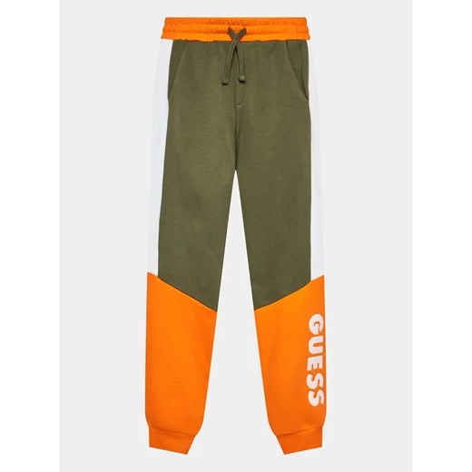 Guess Spodnie dresowe L3BQ11 KAX73 Khaki Relaxed Fit ze sklepu MODIVO w kategorii Spodnie chłopięce - zdjęcie 168452455