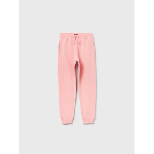 OVS Spodnie dresowe 1593217 Różowy Regular Fit ze sklepu MODIVO w kategorii Spodnie dziewczęce - zdjęcie 168466597