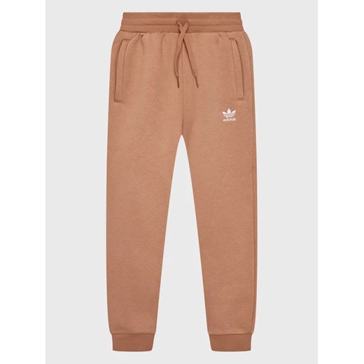 adidas Spodnie dresowe IC6134 Różowy Regular Fit ze sklepu MODIVO w kategorii Spodnie chłopięce - zdjęcie 168484986