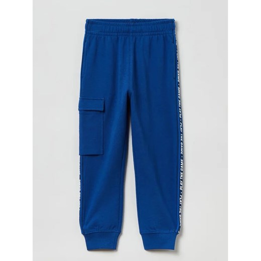 OVS Spodnie dresowe 1821037 Niebieski Regular Fit ze sklepu MODIVO w kategorii Spodnie chłopięce - zdjęcie 168492828