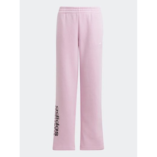 adidas Spodnie dresowe Fleece Kids IJ5953 Różowy Loose Fit ze sklepu MODIVO w kategorii Spodnie dziewczęce - zdjęcie 168503698