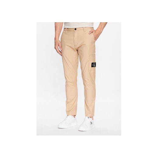 Calvin Klein Jeans Spodnie materiałowe J30J323508 Beżowy Regular Fit XL wyprzedaż MODIVO