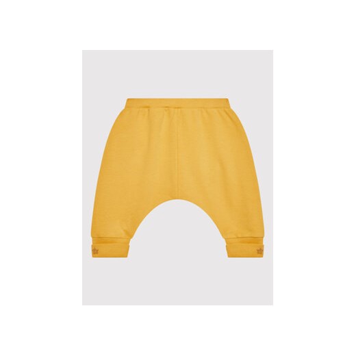 United Colors Of Benetton Spodnie dresowe 3QW0AF00H Żółty Regular Fit ze sklepu MODIVO w kategorii Spodnie i półśpiochy - zdjęcie 168513545