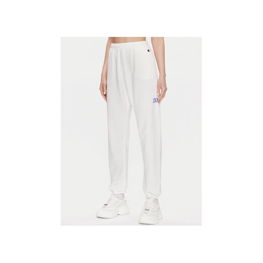 Champion Spodnie dresowe 116083 Biały Regular Fit ze sklepu MODIVO w kategorii Spodnie damskie - zdjęcie 168526276