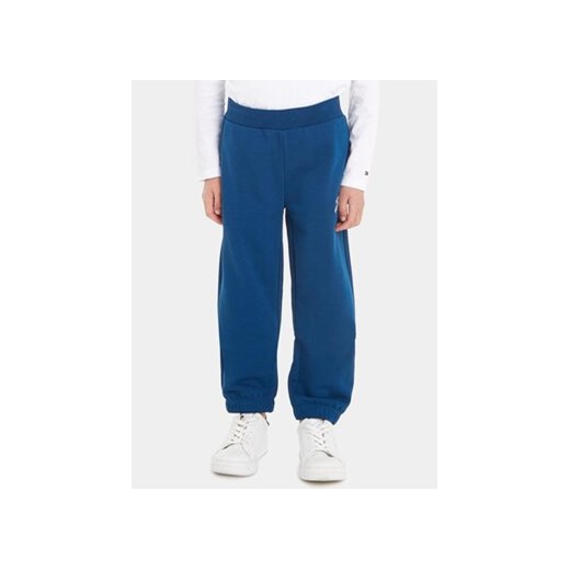 Tommy Hilfiger Spodnie dresowe KB0KB08791 Niebieski Regular Fit ze sklepu MODIVO w kategorii Spodnie chłopięce - zdjęcie 168526408