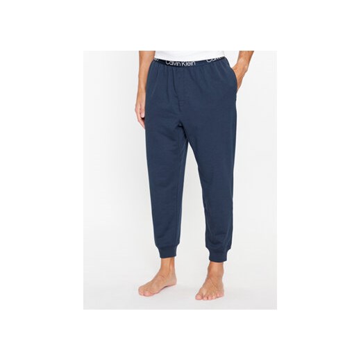 Calvin Klein Underwear Spodnie piżamowe 000NM2175E Niebieski Regular Fit ze sklepu MODIVO w kategorii Piżamy męskie - zdjęcie 168530288