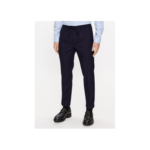Calvin Klein Spodnie materiałowe K10K109956 Granatowy Regular Fit ze sklepu MODIVO w kategorii Spodnie męskie - zdjęcie 168534098