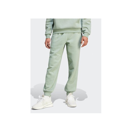 adidas Spodnie dresowe IR8361 Zielony Regular Fit ze sklepu MODIVO w kategorii Spodnie męskie - zdjęcie 168534226