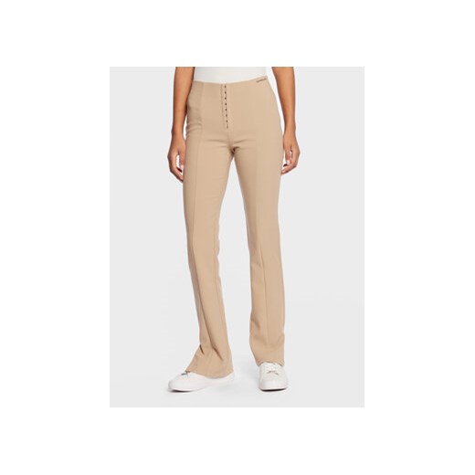 Calvin Klein Jeans Spodnie materiałowe J20J220529 Beżowy Slim Fit S wyprzedaż MODIVO