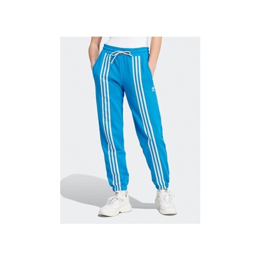 adidas Spodnie dresowe IK7852 Niebieski ze sklepu MODIVO w kategorii Spodnie damskie - zdjęcie 168544288