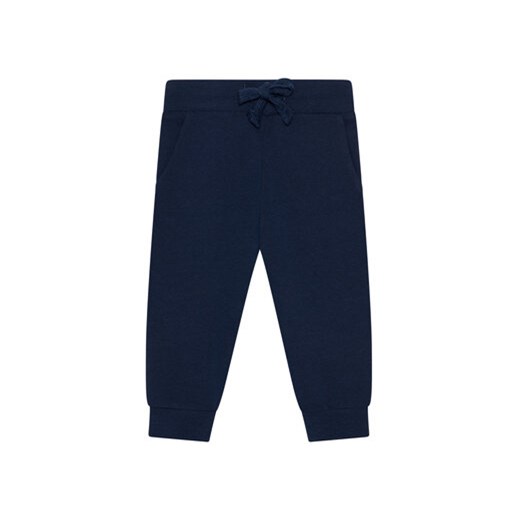 Guess Spodnie dresowe L93Q24 KAUG0 Granatowy Regular Fit ze sklepu MODIVO w kategorii Spodnie chłopięce - zdjęcie 168544816