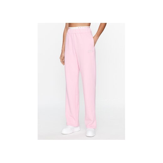 Ellesse Spodnie dresowe Vernetti SGT19237 Różowy Relaxed Fit ze sklepu MODIVO w kategorii Spodnie damskie - zdjęcie 168546225