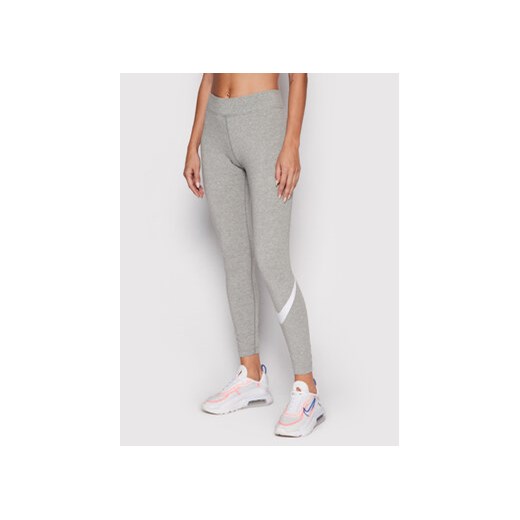 Nike Legginsy Sportswear Essential CZ8530 Szary Slim Fit ze sklepu MODIVO w kategorii Spodnie damskie - zdjęcie 168546646
