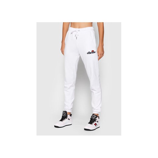 Ellesse Spodnie dresowe Noora SGK13459 Biały Regular Fit ze sklepu MODIVO w kategorii Spodnie damskie - zdjęcie 168554518