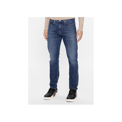 Calvin Klein Jeans Jeansy J30J323372 Granatowy Slim Fit ze sklepu MODIVO w kategorii Jeansy męskie - zdjęcie 168558338