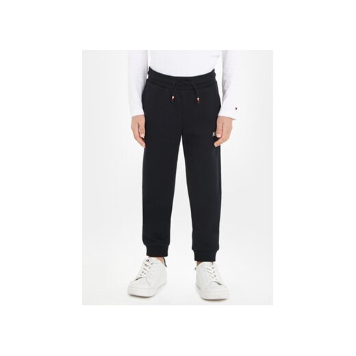 Tommy Hilfiger Spodnie dresowe KB0KB08475 S Granatowy Regular Fit ze sklepu MODIVO w kategorii Spodnie chłopięce - zdjęcie 168561816