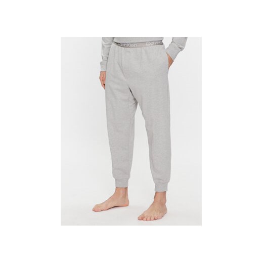 Calvin Klein Underwear Spodnie piżamowe 000NM2175E Szary Relaxed Fit ze sklepu MODIVO w kategorii Piżamy męskie - zdjęcie 168565168