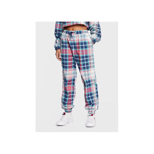 Tommy Jeans Joggery Tjw DW0DW14626 Niebieski Relaxed Fit ze sklepu MODIVO w kategorii Spodnie damskie - zdjęcie 168570977
