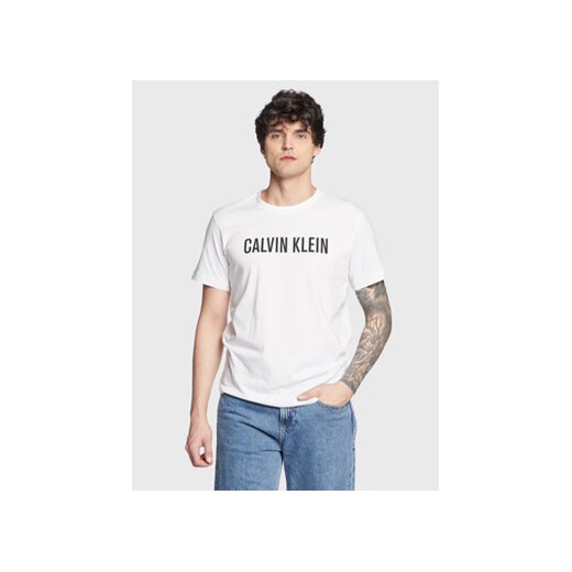 Calvin Klein Swimwear T-Shirt Logo KM0KM00836 Biały Regular Fit ze sklepu MODIVO w kategorii T-shirty męskie - zdjęcie 168572316