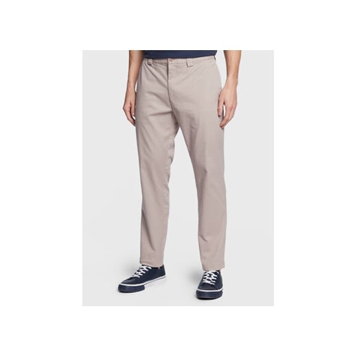 Tommy Jeans Chinosy Dad DM0DM13491 Beżowy Regular Fit ze sklepu MODIVO w kategorii Spodnie męskie - zdjęcie 168573569