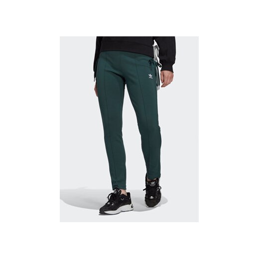 adidas Spodnie dresowe Always Original Laced HK5083 Zielony Slim Fit ze sklepu MODIVO w kategorii Spodnie damskie - zdjęcie 168575329