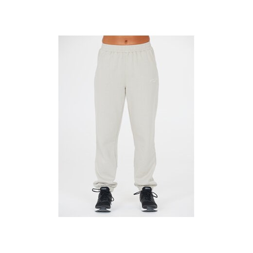 Athlecia Spodnie dresowe Asport W Pants EA233347 Beżowy Regular Fit ze sklepu MODIVO w kategorii Spodnie damskie - zdjęcie 168580147