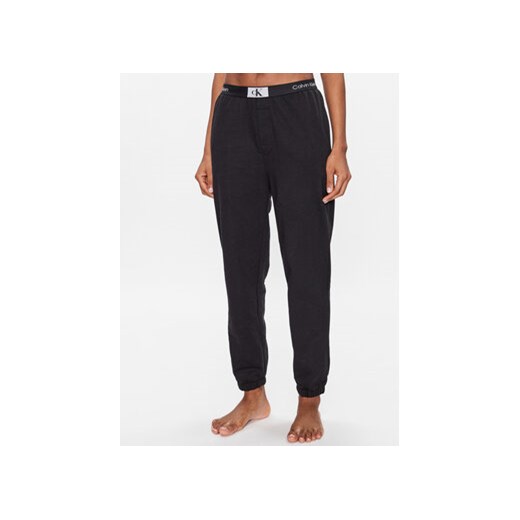 Calvin Klein Underwear Spodnie piżamowe 000QS6943E Czarny Relaxed Fit ze sklepu MODIVO w kategorii Piżamy damskie - zdjęcie 168581198