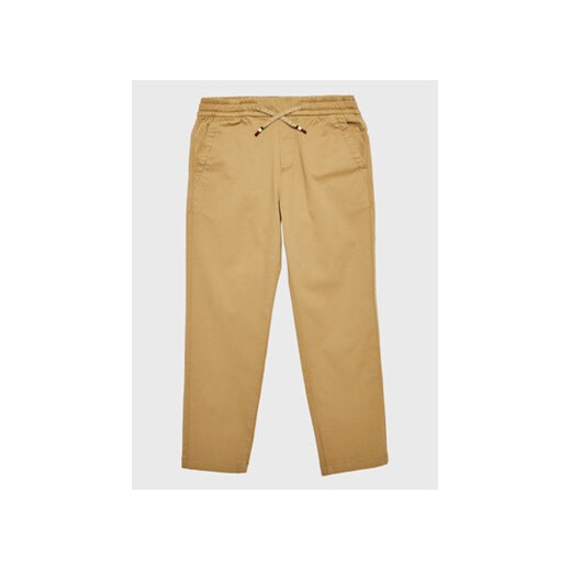 Tommy Hilfiger Spodnie materiałowe KB0KB07980 D Brązowy Tapered Fit ze sklepu MODIVO w kategorii Spodnie chłopięce - zdjęcie 168581529