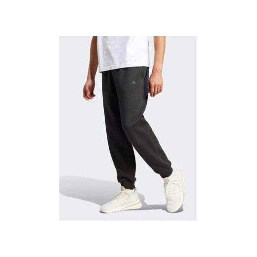 adidas Spodnie dresowe IR8360 Czarny Regular Fit ze sklepu MODIVO w kategorii Spodnie męskie - zdjęcie 168586787