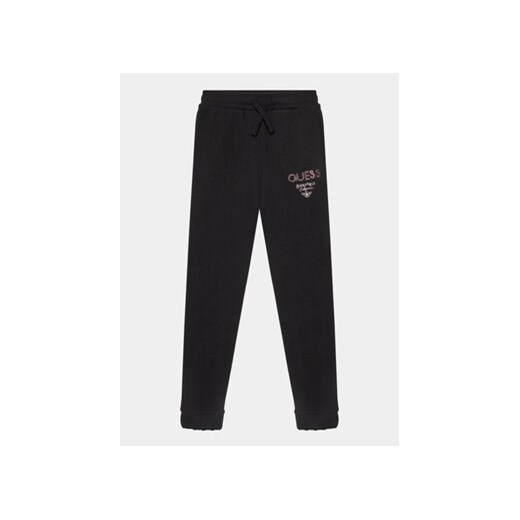 Guess Spodnie dresowe J4RQ11 KA6R4 Czarny Regular Fit ze sklepu MODIVO w kategorii Spodnie chłopięce - zdjęcie 168596698