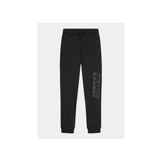Guess Spodnie dresowe L3BQ12 KAD74 Czarny Relaxed Fit ze sklepu MODIVO w kategorii Spodnie chłopięce - zdjęcie 168607067