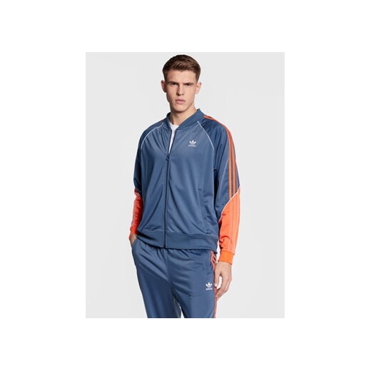 adidas Bluza Tricot Sst Track HI3003 Niebieski Regular Fit ze sklepu MODIVO w kategorii Bluzy męskie - zdjęcie 168610649