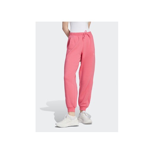 adidas Spodnie dresowe ALL SZN Fleece IM0334 Różowy Loose Fit ze sklepu MODIVO w kategorii Spodnie damskie - zdjęcie 168615937