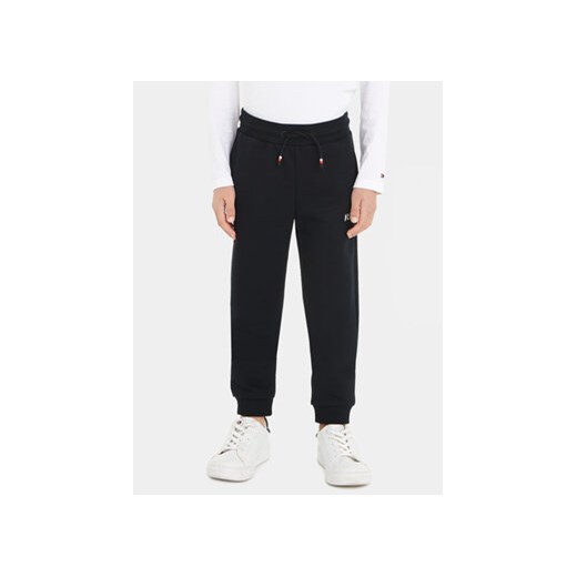 Tommy Hilfiger Spodnie dresowe KB0KB08475 M Granatowy Regular Fit ze sklepu MODIVO w kategorii Spodnie chłopięce - zdjęcie 168615988