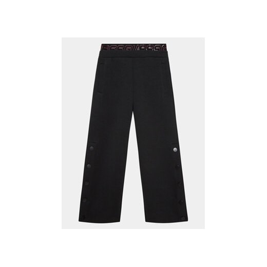 Guess Spodnie dresowe J3YQ18 FL03S Czarny Regular Fit ze sklepu MODIVO w kategorii Spodnie dziewczęce - zdjęcie 168616645