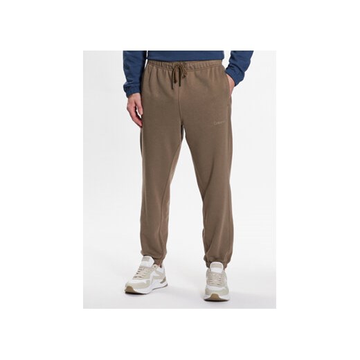 Calvin Klein Performance Spodnie dresowe Knitt Pant 00GMS3P604 Khaki Relaxed Fit ze sklepu MODIVO w kategorii Spodnie męskie - zdjęcie 168619926