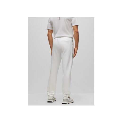 Boss Spodnie dresowe 50488826 Biały Relaxed Fit ze sklepu MODIVO w kategorii Spodnie męskie - zdjęcie 168621087
