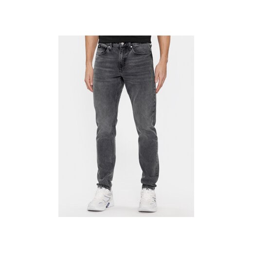 Calvin Klein Jeans Jeansy J30J324196 Szary Slim Taper Fit ze sklepu MODIVO w kategorii Jeansy męskie - zdjęcie 168623688