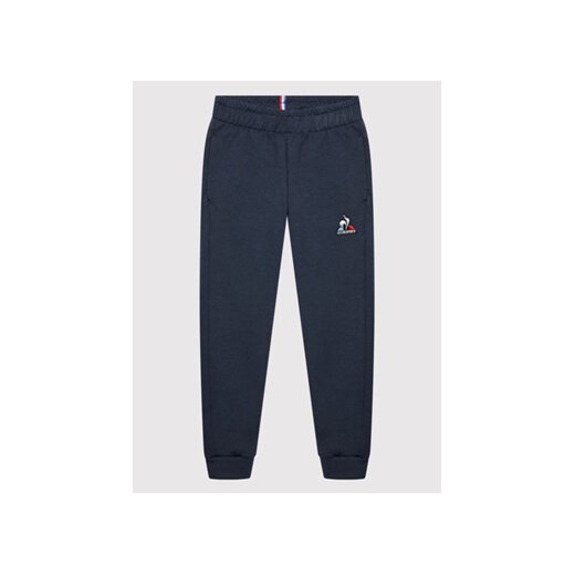 Le Coq Sportif Spodnie dresowe 2210491 Granatowy Slim Fit ze sklepu MODIVO w kategorii Spodnie chłopięce - zdjęcie 168626776