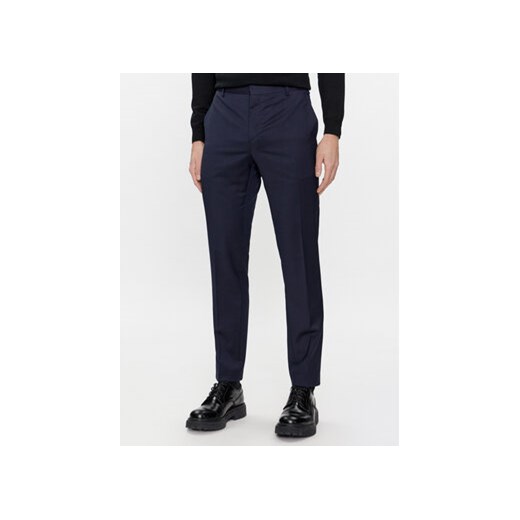 Calvin Klein Chinosy K10K112292 Granatowy Slim Fit ze sklepu MODIVO w kategorii Spodnie męskie - zdjęcie 168631857