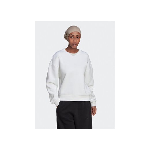 adidas Bluza ALL SZN Fleece Sweatshirt HJ7997 Biały Loose Fit ze sklepu MODIVO w kategorii Bluzy damskie - zdjęcie 168633695